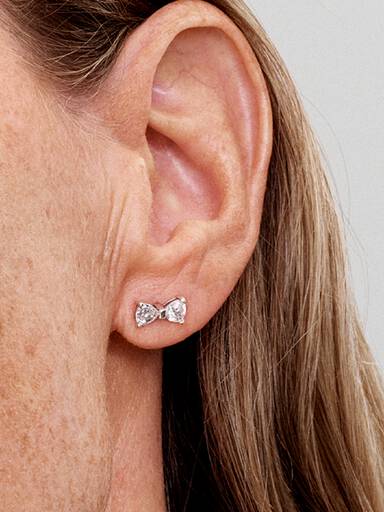 Puzetové náušnice s trblietavou mašličkou